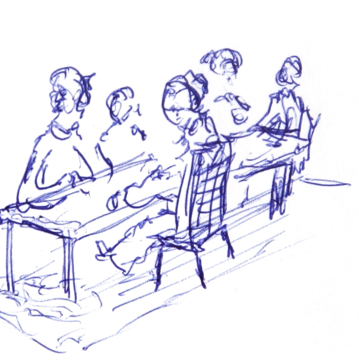 5 Menschen an einem Tisch